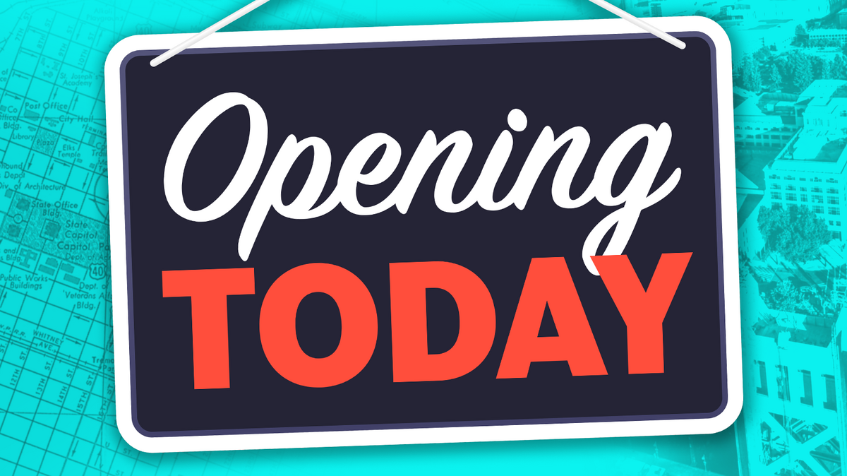 Opening Today sign using a chalkboard with lettering.